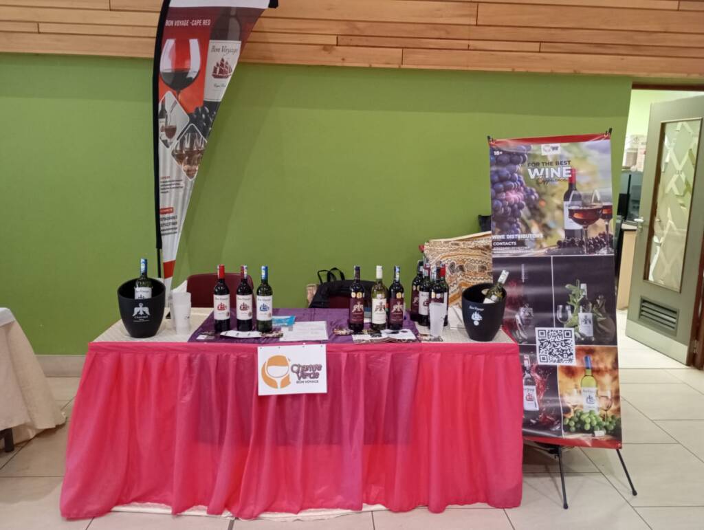 Bonvoyage wine display with event banner